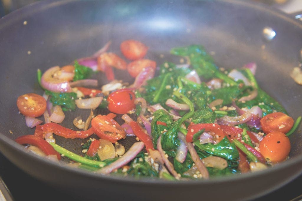 Vegetables being sautéed - Photo by Raul J. Colon
