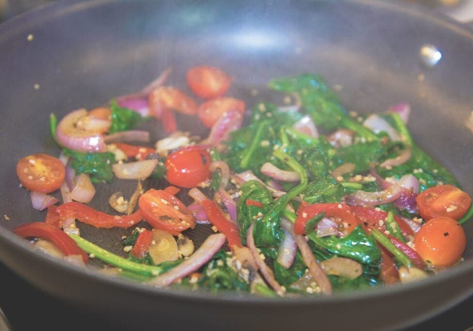 Vegetables being sautéed - Photo by Raul J. Colon